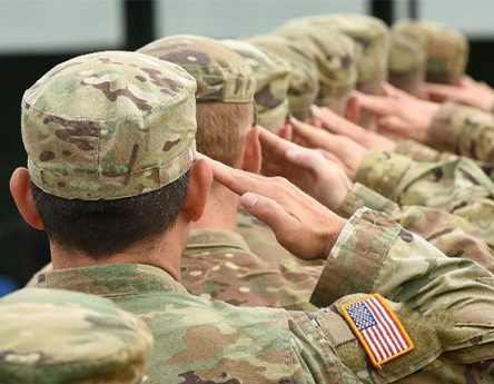 Photo of US soldier's backs as they salute (photo)