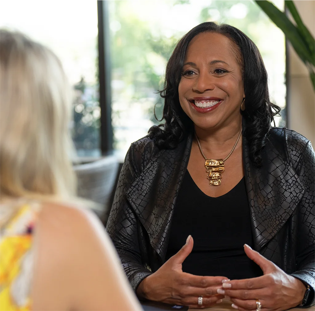 Wanda Bryant Hope, Chief Diversity Equity & Inclusion Officer meets with a colleague at Johnson & Johnson Headquarters in New Brunswick, NJ. (photo)