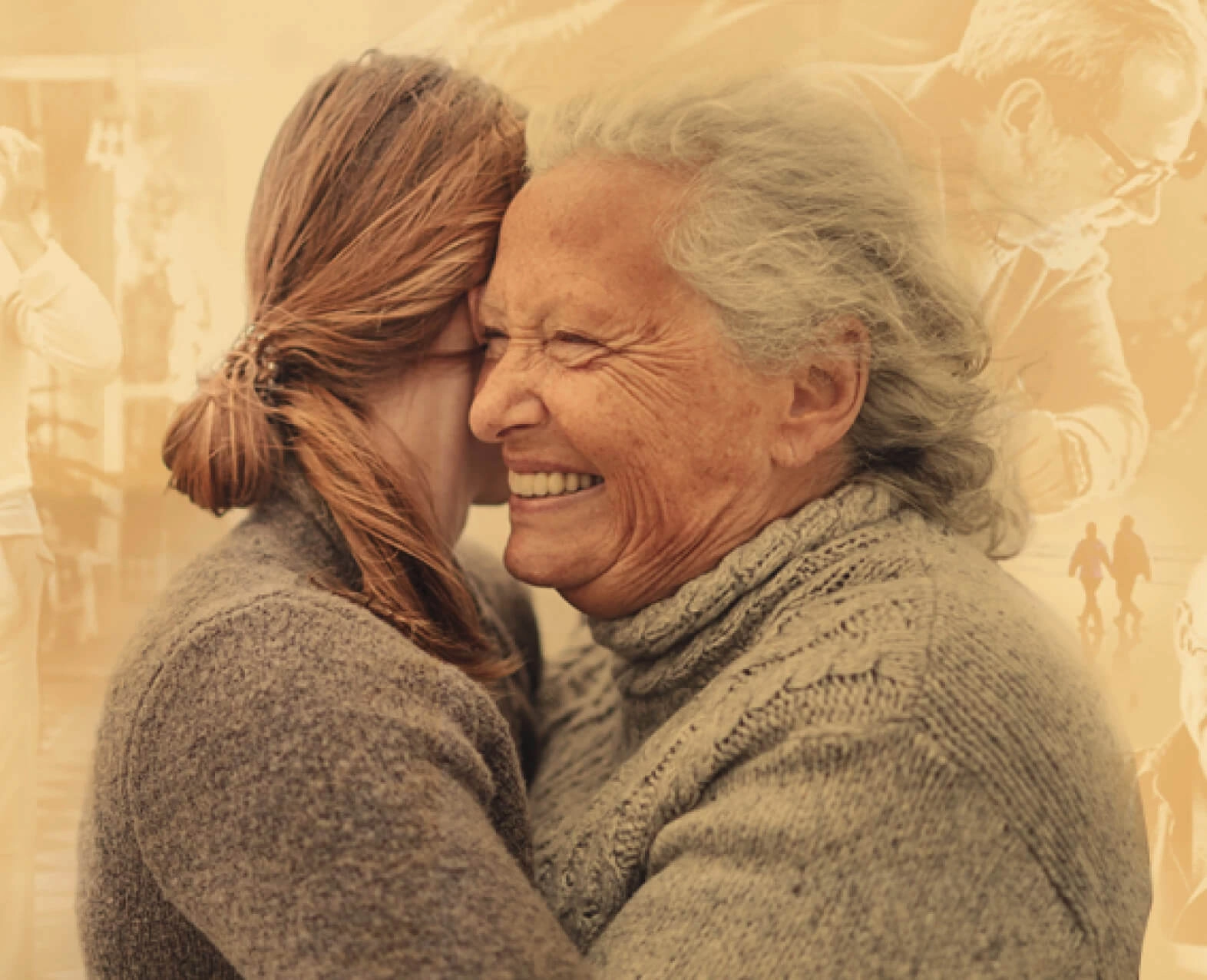 An elderly woman and a younger woman embracing and smiling warmly. (photo)